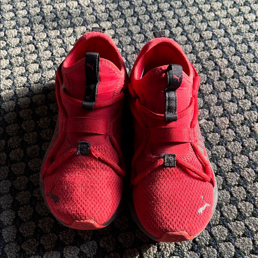 Puma red slip on shoes.  Size 4.5